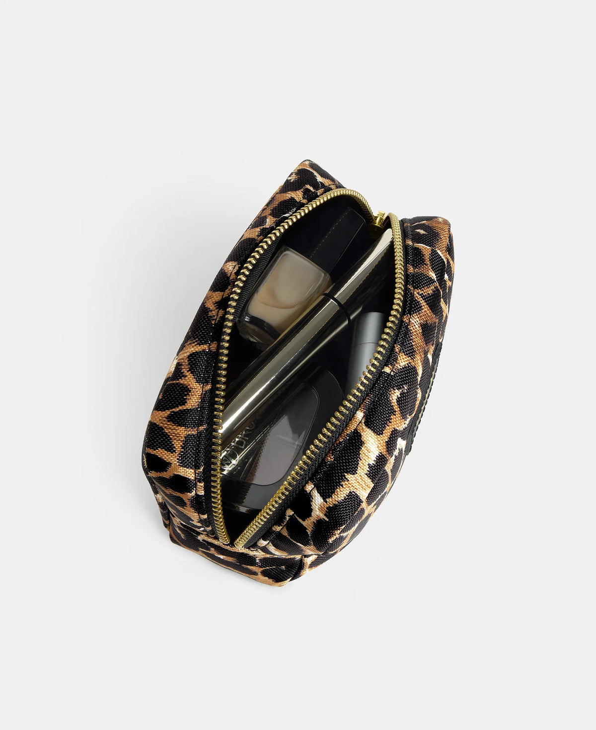 WOUF Icon Make Up Bag open from above showing cosmetics inside